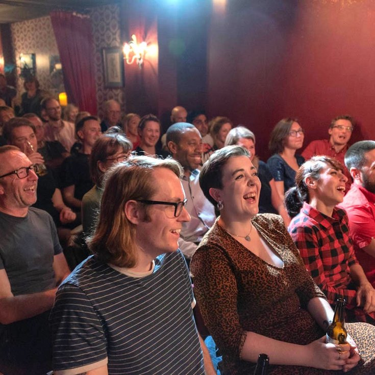 Audience laughing