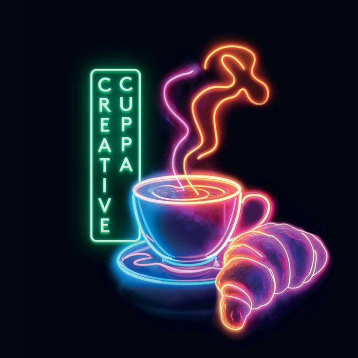 A neon sign with a coffee, croissant and text reading 'Creative Cuppa'