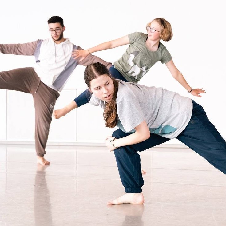 A group of young people dancing.