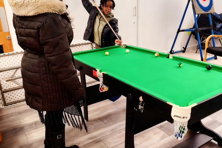 People playing snooker at Tuesday link up