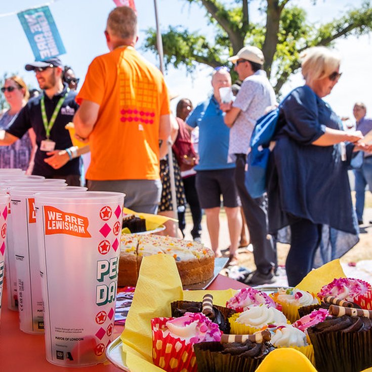 People's Day stall with cups and cakes