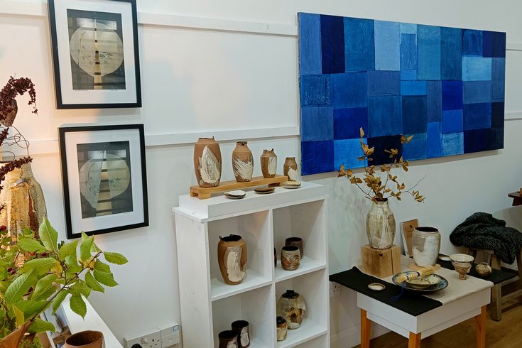 Gallery White Box paintings, photo prints and ceramics exhibition on display.