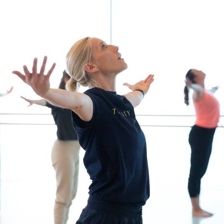 A group of people dancing.