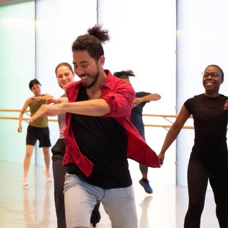 A group of people dancing.