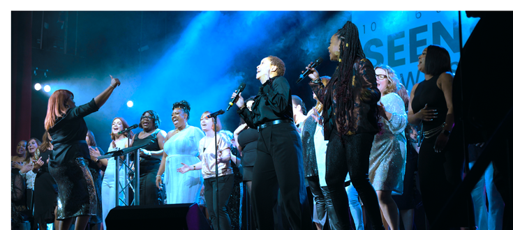 Choir performing on stage at SEEN festival