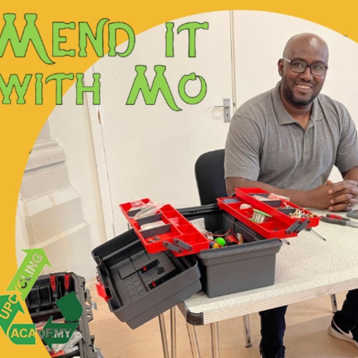 Smiling man with toolbox