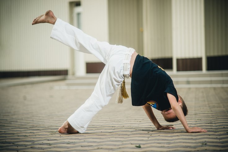 Child doing Capoeira