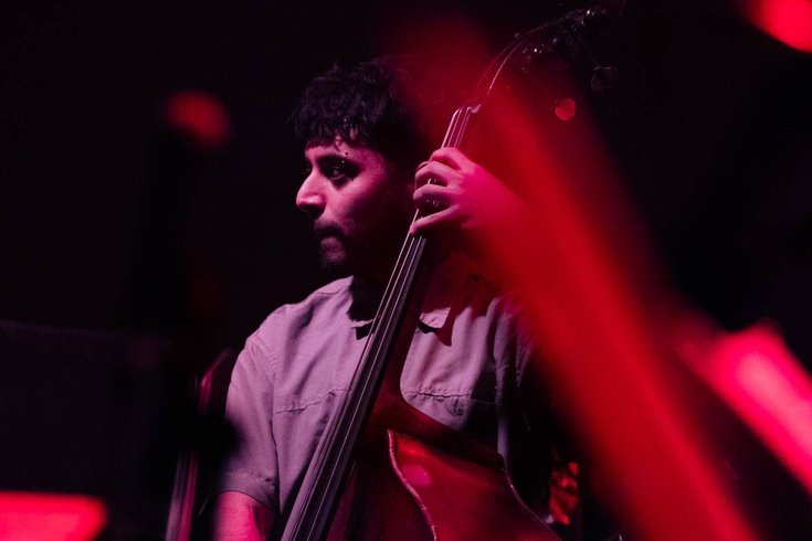 A musician playing the double bass
