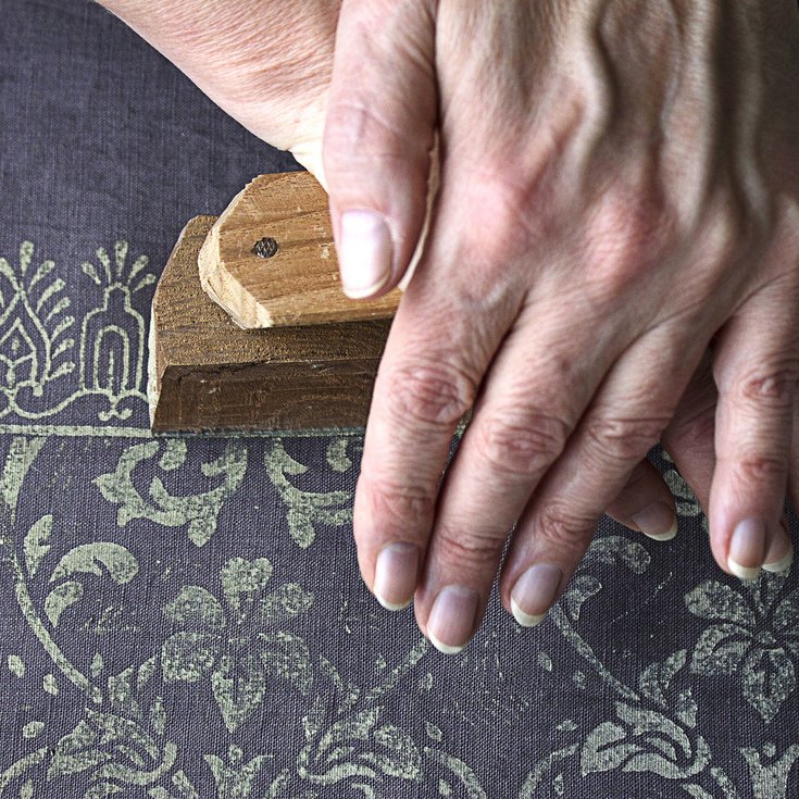 Person using a wood block