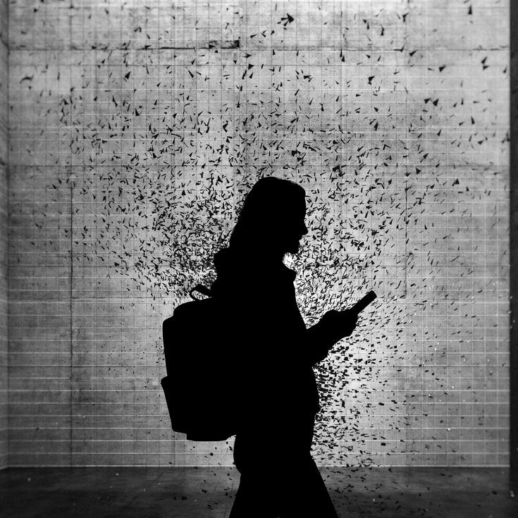 Silhouette of woman walking