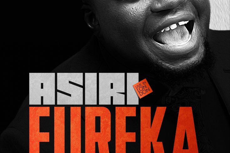A man in a suit smiles widely on a comedy event poster titled "ASIRI EUREKA," taking place at Catford Broadway Theatre on September 20th at 6pm.