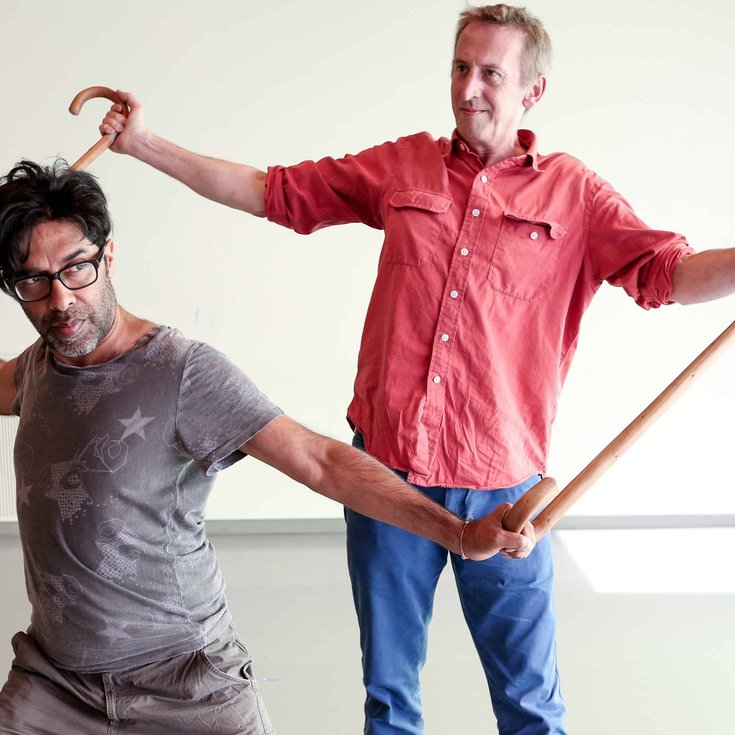 Two men dancing.