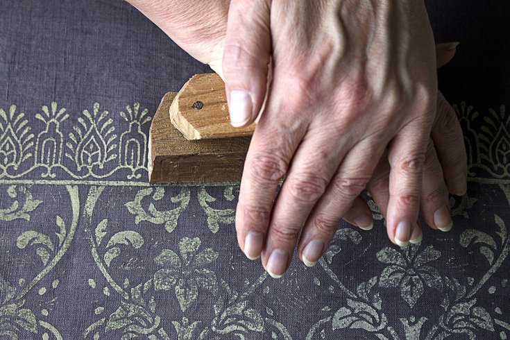 Person using a wood block