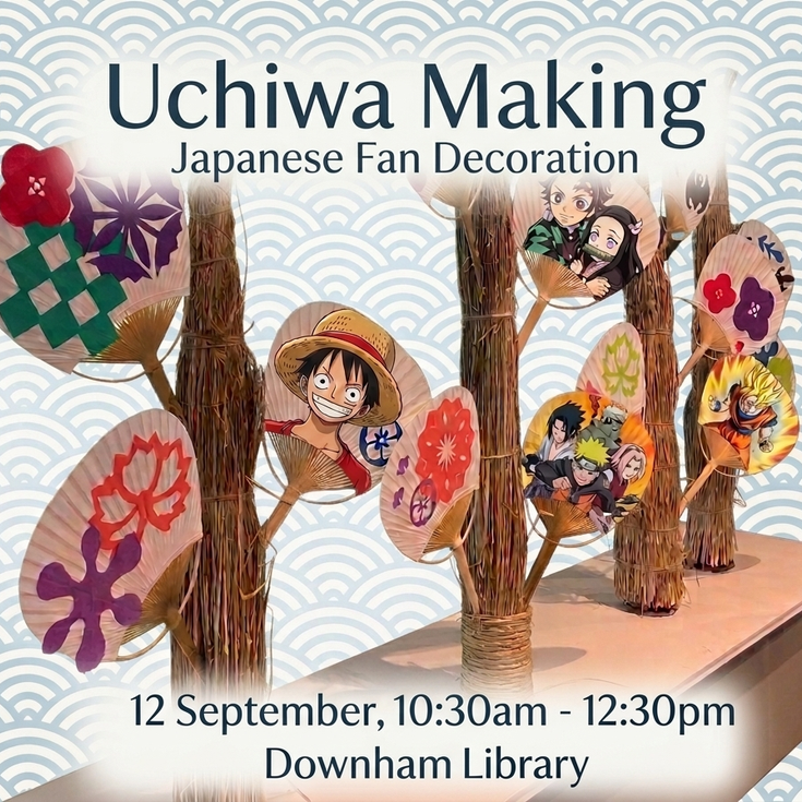 Paper fan decorated with paper cut out patterns and some anime characters