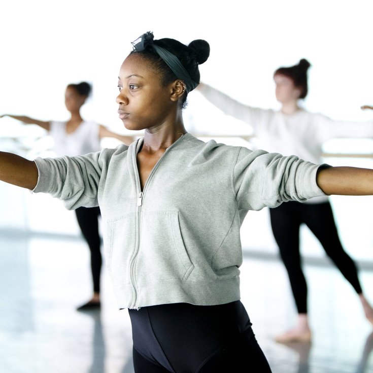 A group of young people dancing.