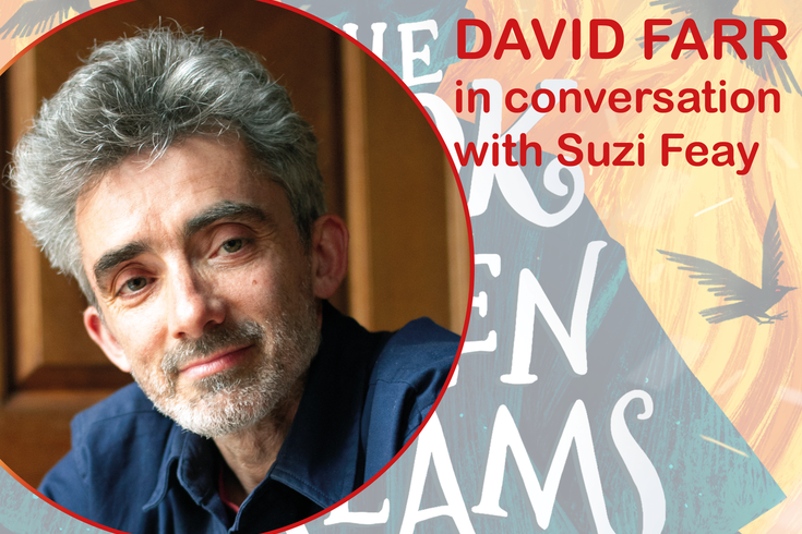 Male with grey hair and stubble smiling at the camera background is a book cover