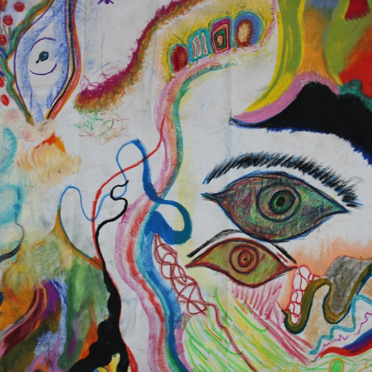 Close up of a collective artwork made by Arts Network members and collaborators, of colourful shapes and lines blurring into each other, made using oil pastels on a white background.