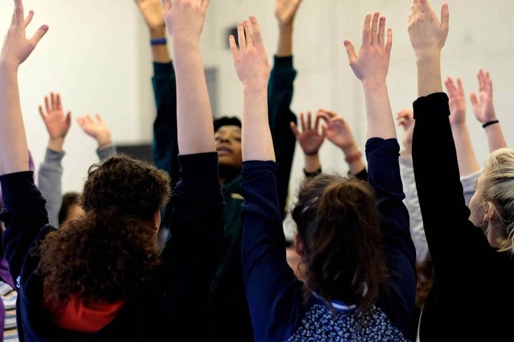 A group of people dancing.