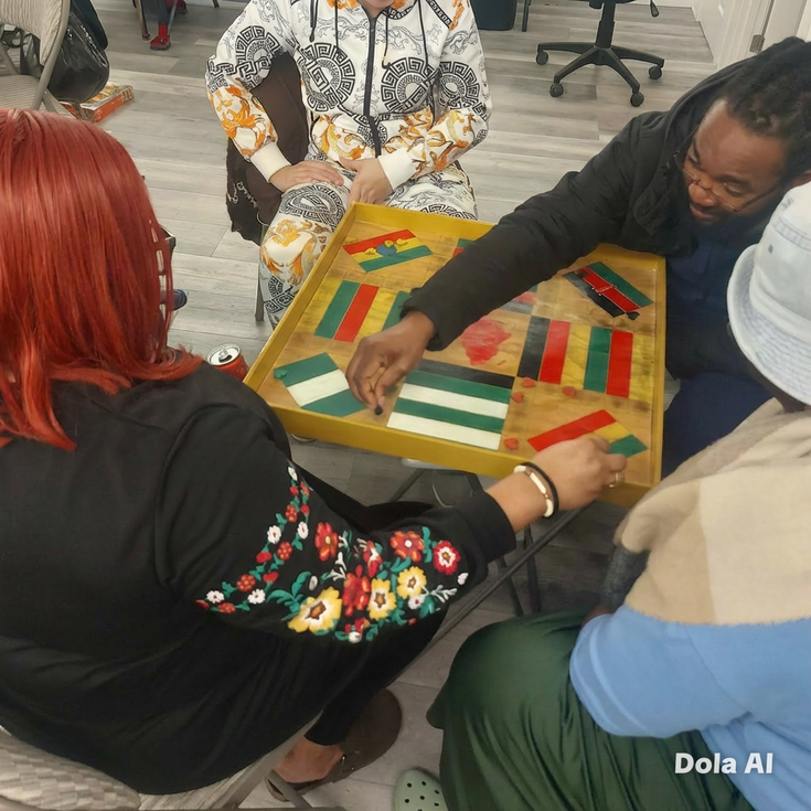 People playing board games at Tuesday link up