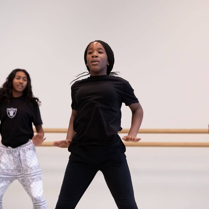 A group of young people dancing.
