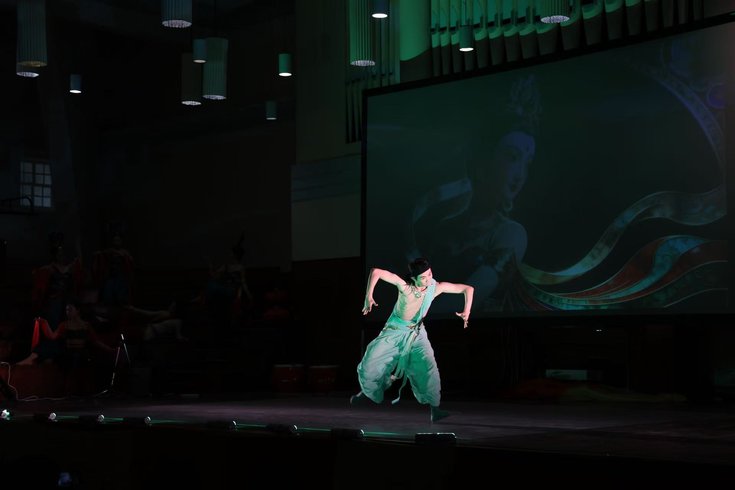 Costumed dancer performing Chinese Dunhuang Dance