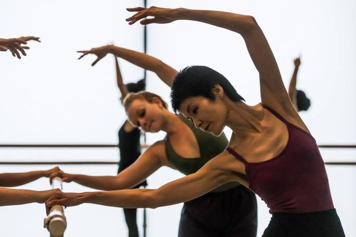 A group of people dancing.