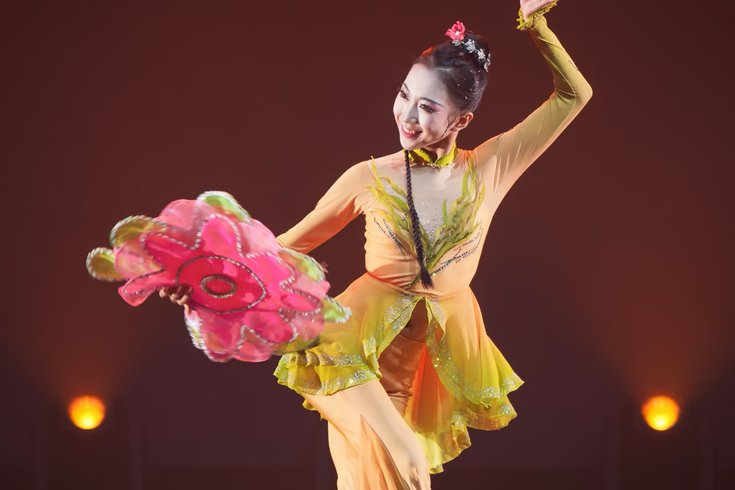 Costumed dancer performing Chinese Handkerchief Dance