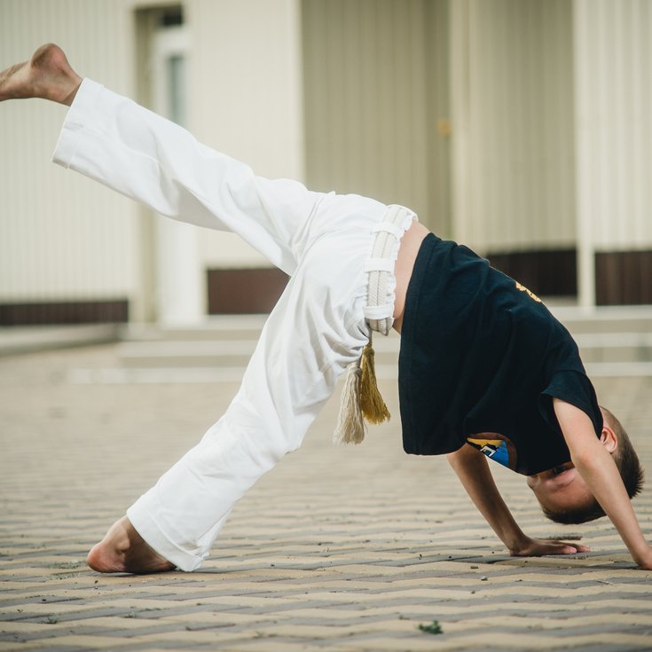 Child doing Capoeira