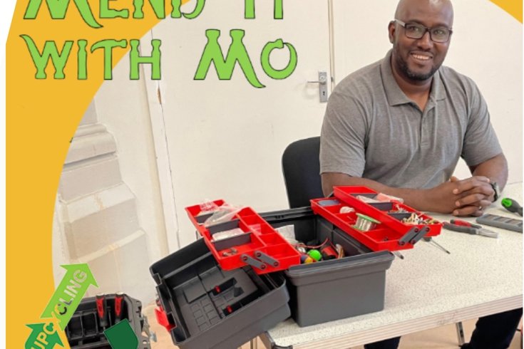 Smiling man with toolbox