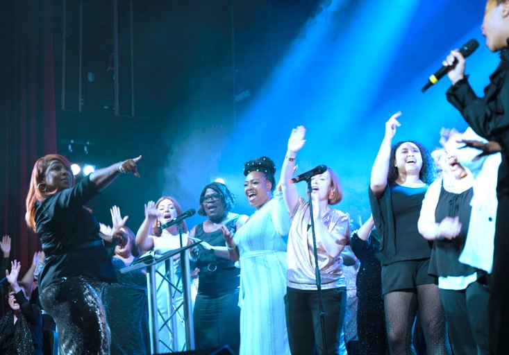 Choir performing on stage at SEEN festival